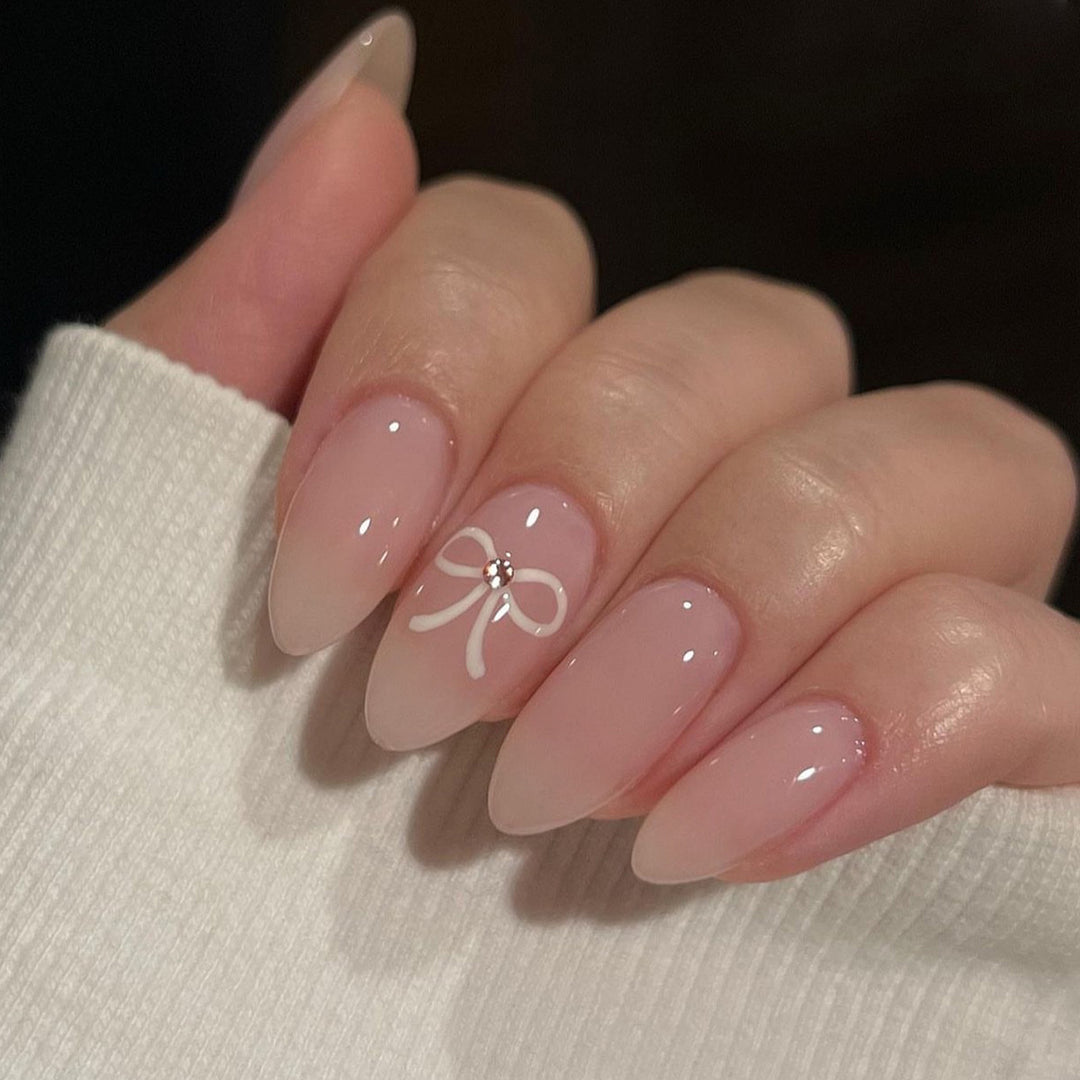 Artificia nails with delicate bow accents Kalsten