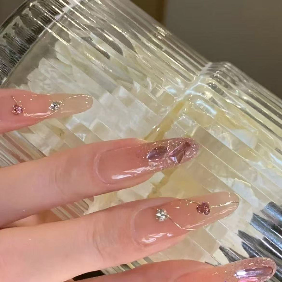 Artistic Nail Extensions with Glitter Accents Kalsten