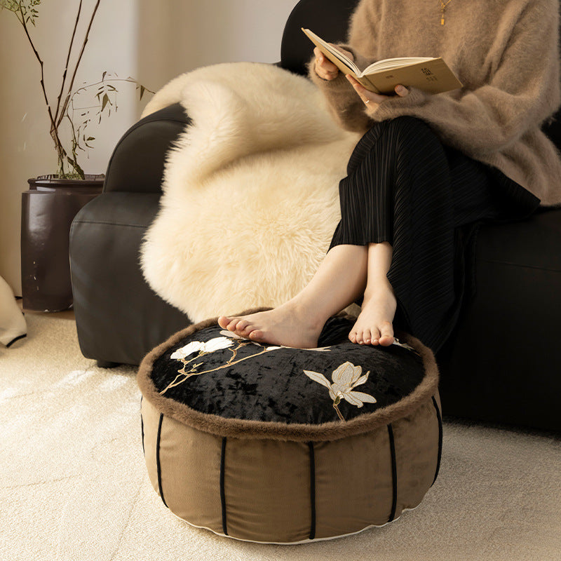 Round upholstered velvet floor cushion pouf with faux fur trim and handle Kalsten