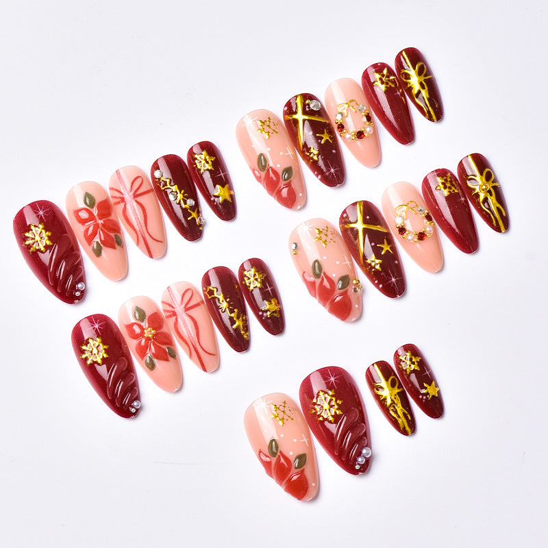 Artificial nail set in festive winter design with glamorous accents Kalsten