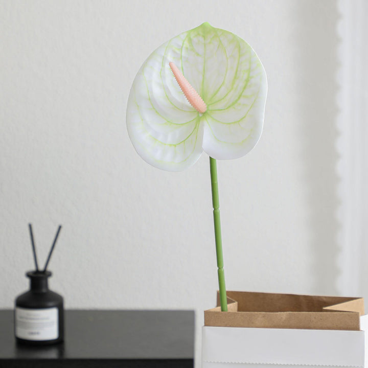 Elegant artificial orchid with delicate flowers