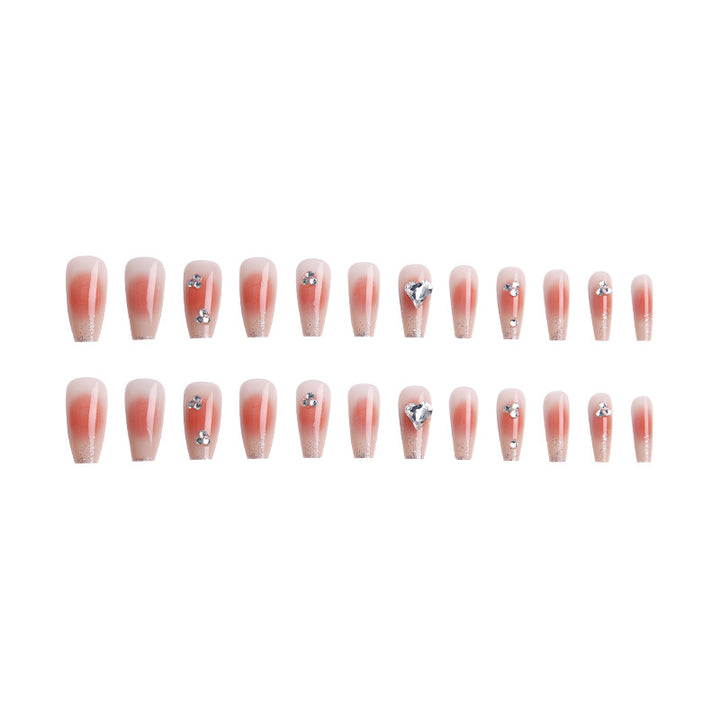 Acrylic nail set with elegant heart and rhinestone decorations Kalsten