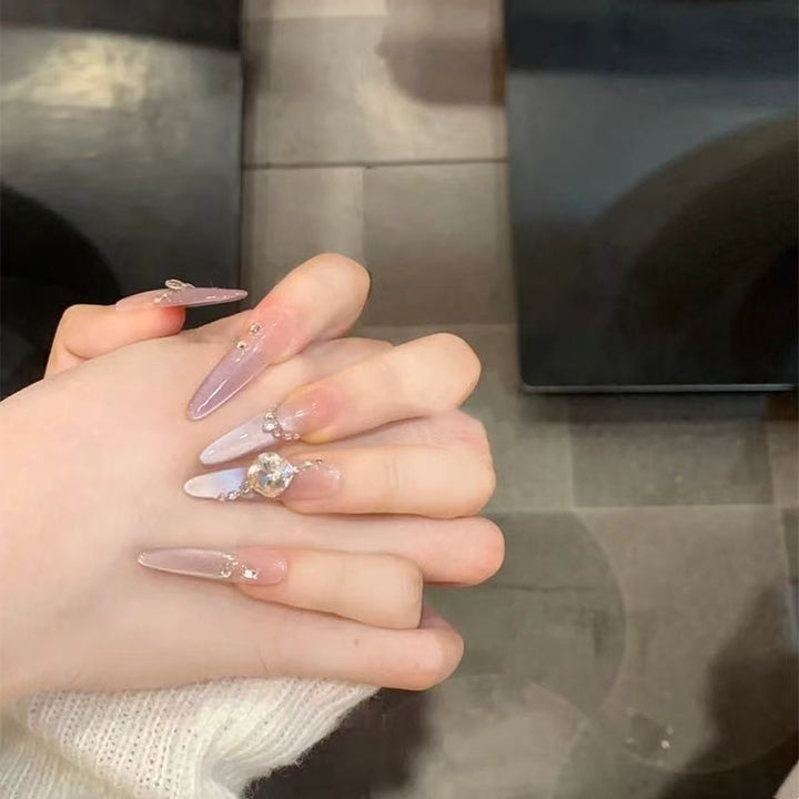 Artistic Stiletto Press-On Nail Art with Glimmering Accents Kalsten
