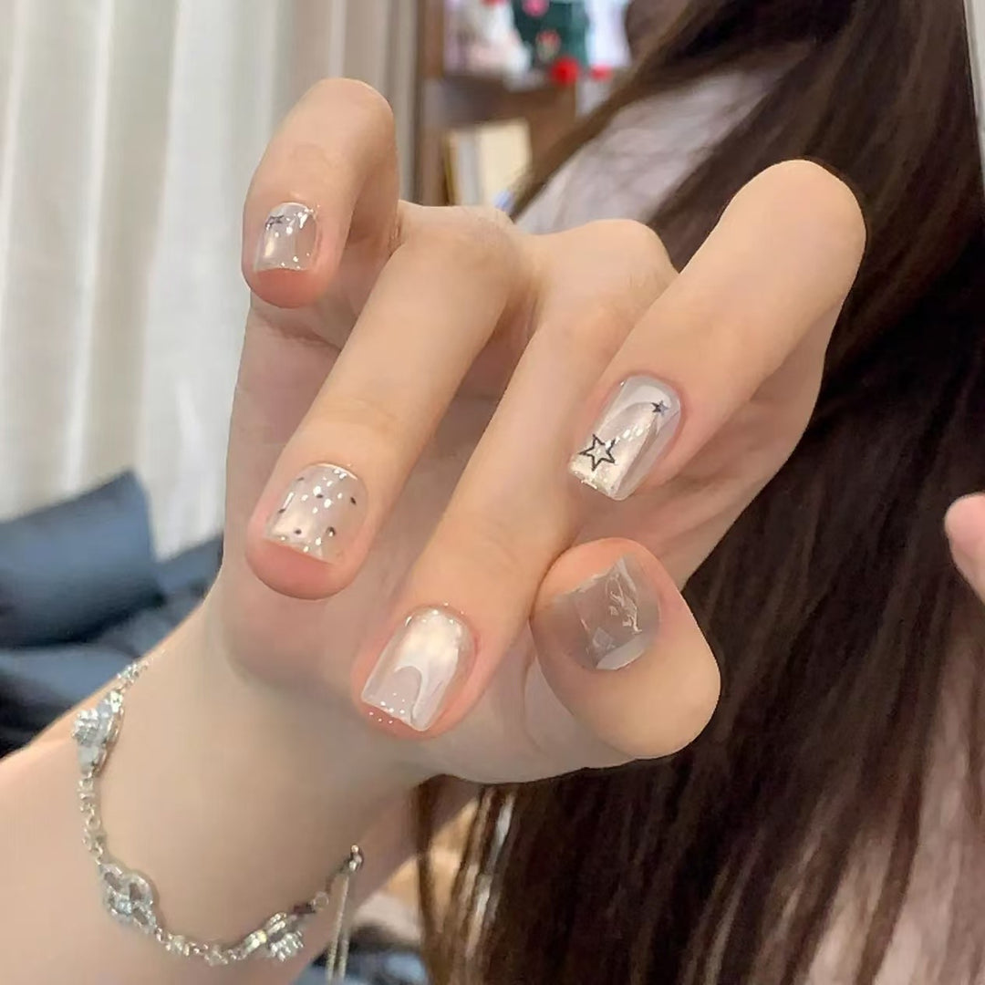 Artistic Star-Design Nail Extensions