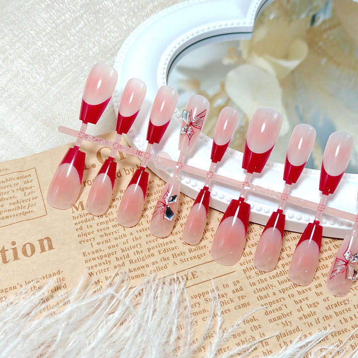 Artificial nails with elegant floral design and glitter accents Kalsten