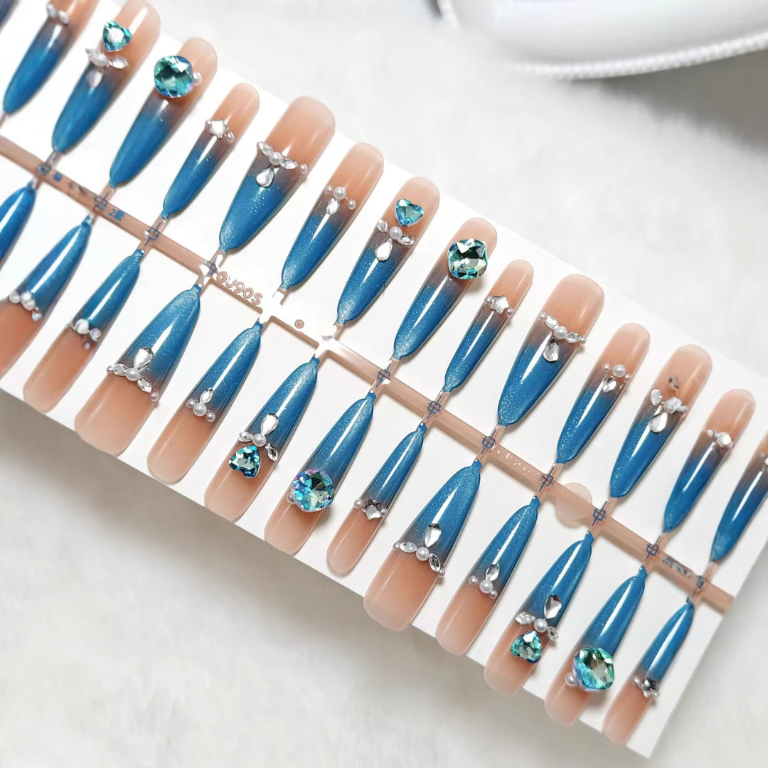 Glamorous artificial nails with sparkling rhinestone elements Kalsten