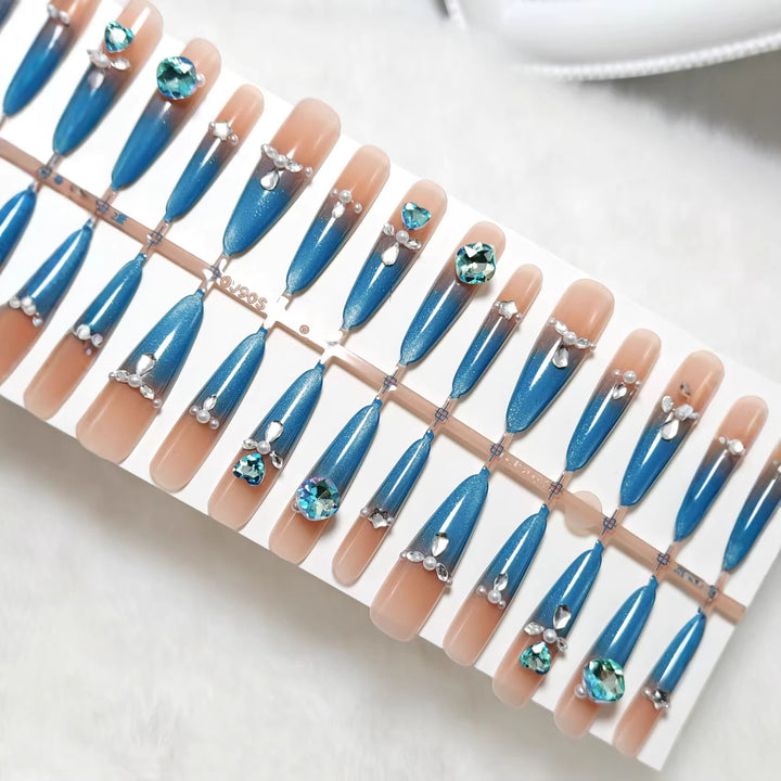 Glamorous artificial nails with sparkling rhinestone elements Kalsten