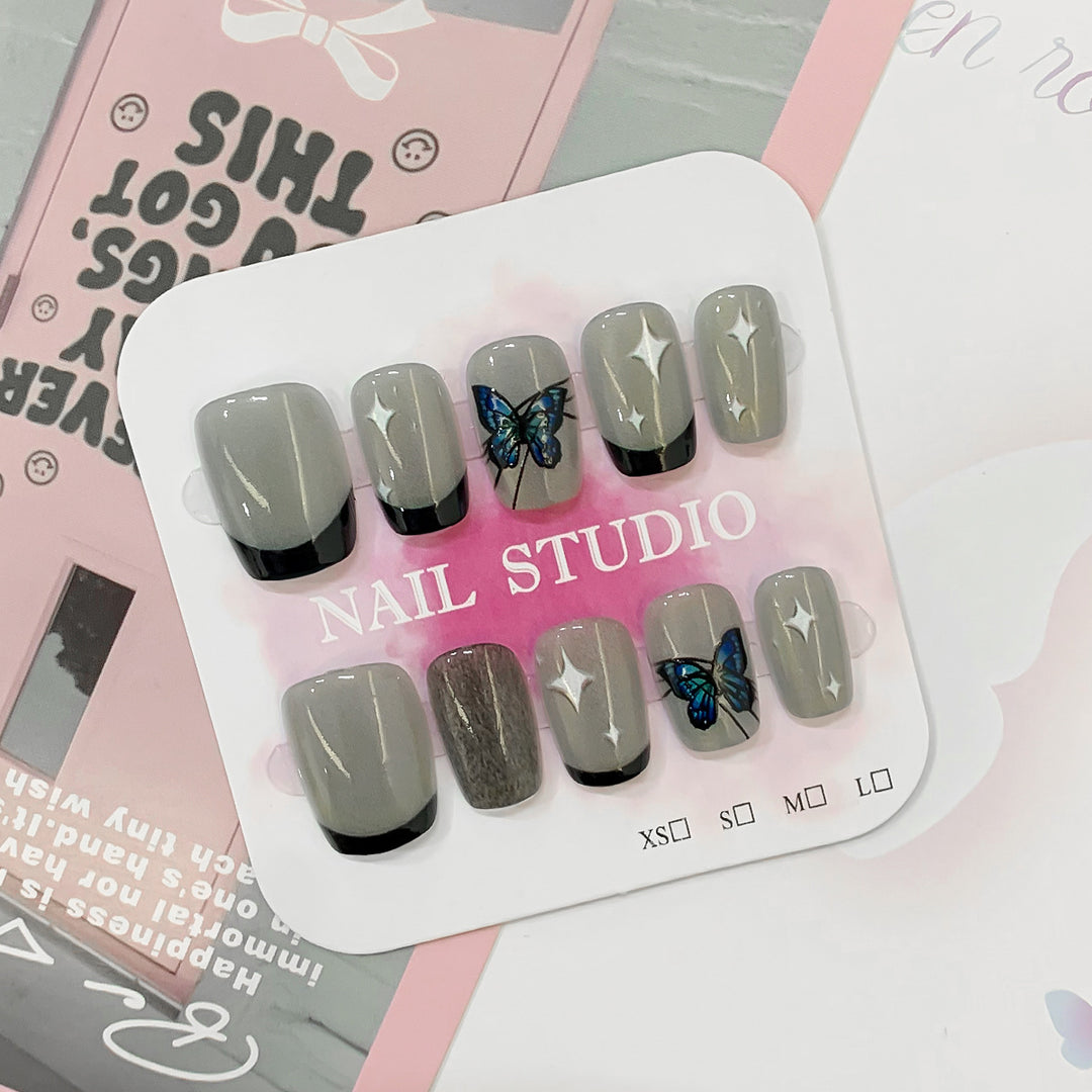 Artistic nail tips with butterfly designs Kalsten