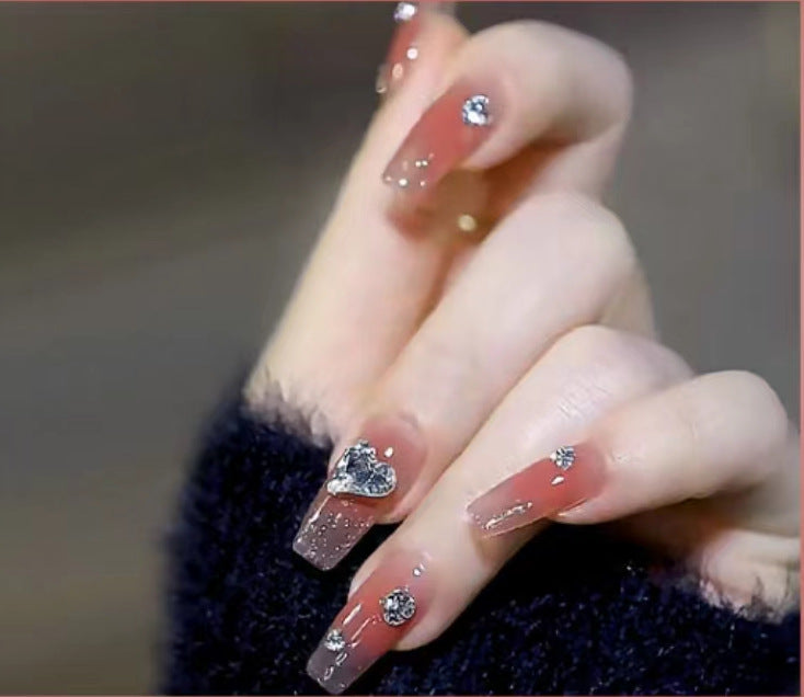 Elegant Nail Art with Glitter and Rhinestones Kalsten