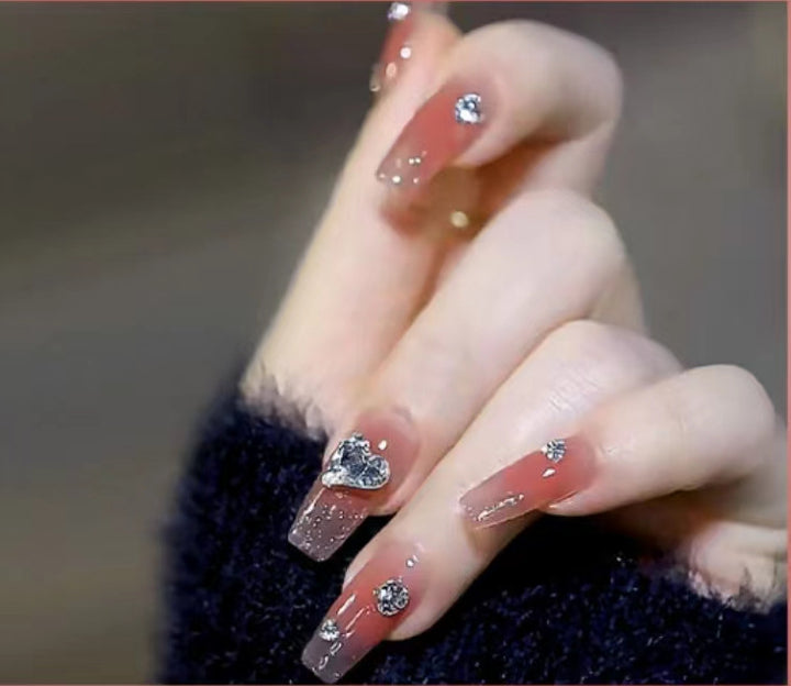Elegant Nail Art with Glitter and Rhinestones Kalsten