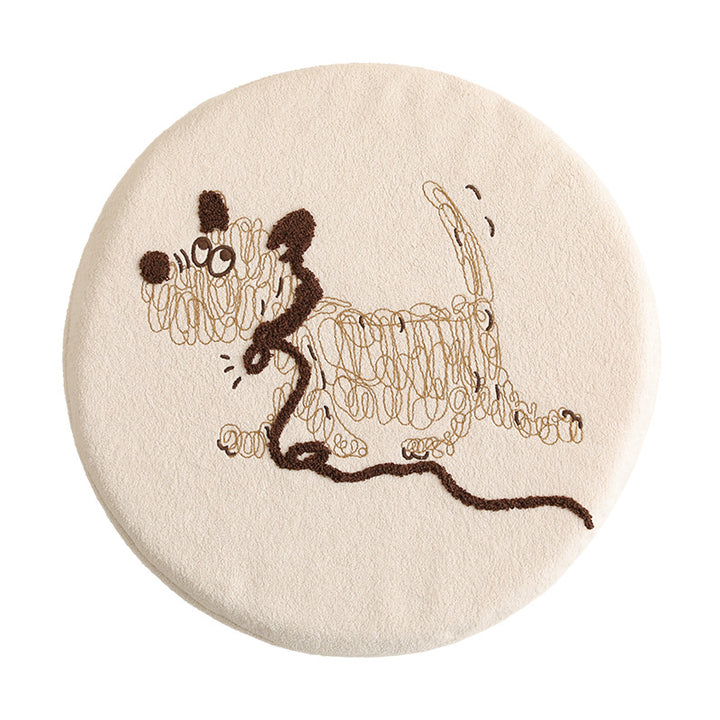 Round padded seat cushion with embroidered cat motif