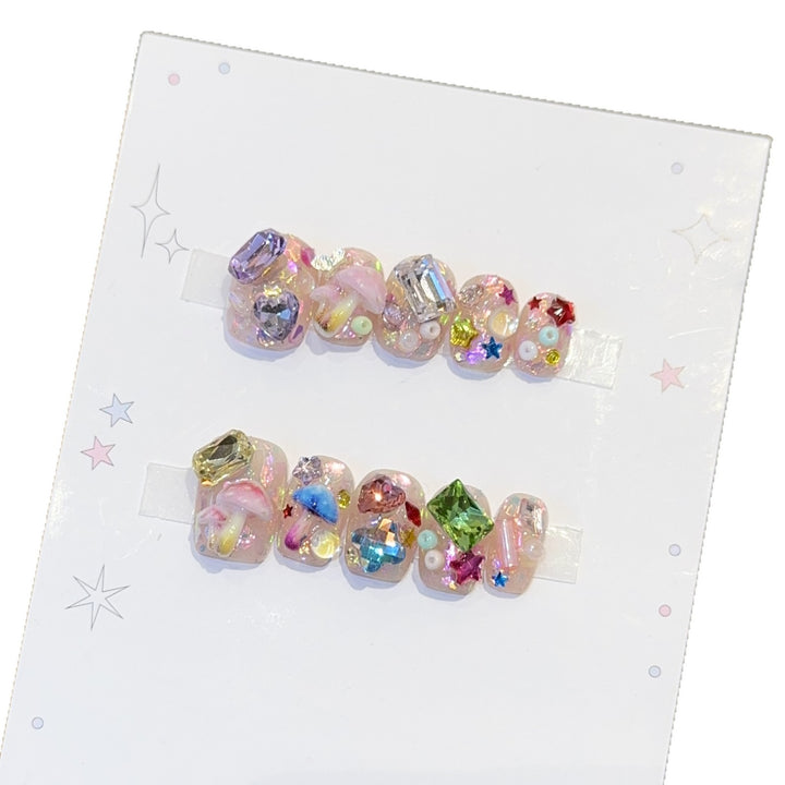Artificial nails with sparkling crystal accents Kalsten