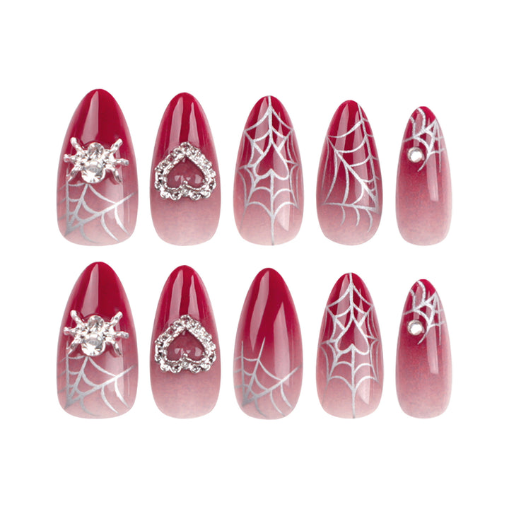 Nail art set with filigree spider web design and glitter accents Kalsten