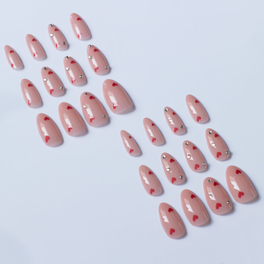Artistic Press-On Nail Art with Heart Accents