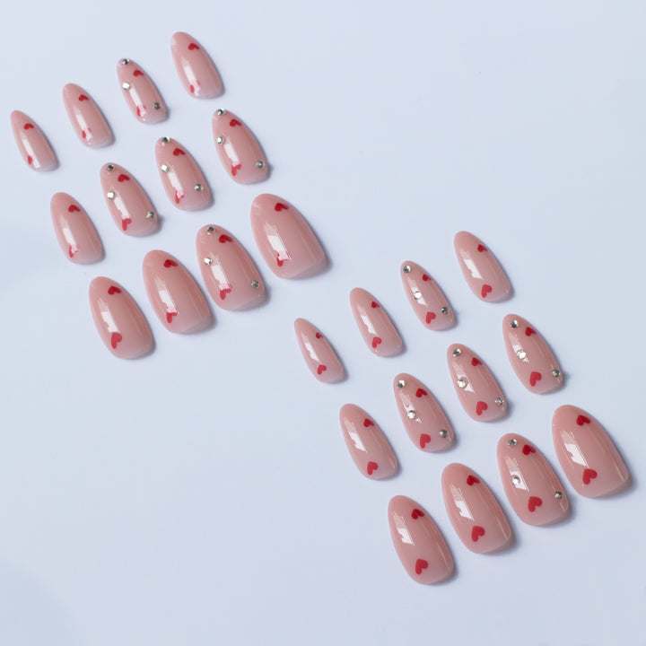 Artistic Press-On Nail Art with Heart Accents