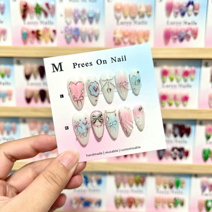 Artistic Press-On Nail Art Set with Heart and Bow Designs