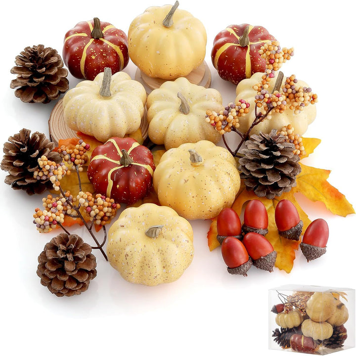 Autumn decorative set made of realistic artificial pumpkins, pine cones, acorns, and maple leaves