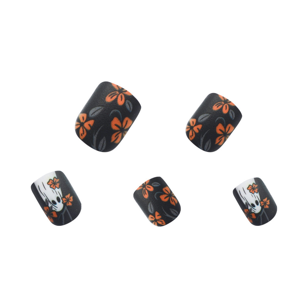 Acrylic nail set with spooky ghost design and floral accents Kalsten