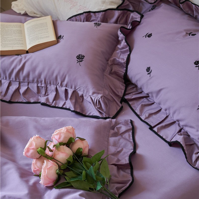 Bedding set with embroidered roses, ruffle details and extra soft cotton satin
