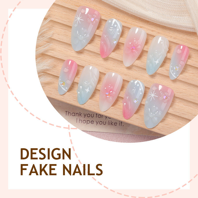 Acrylic nail set with elegant ombre design and floral decorations Kalsten