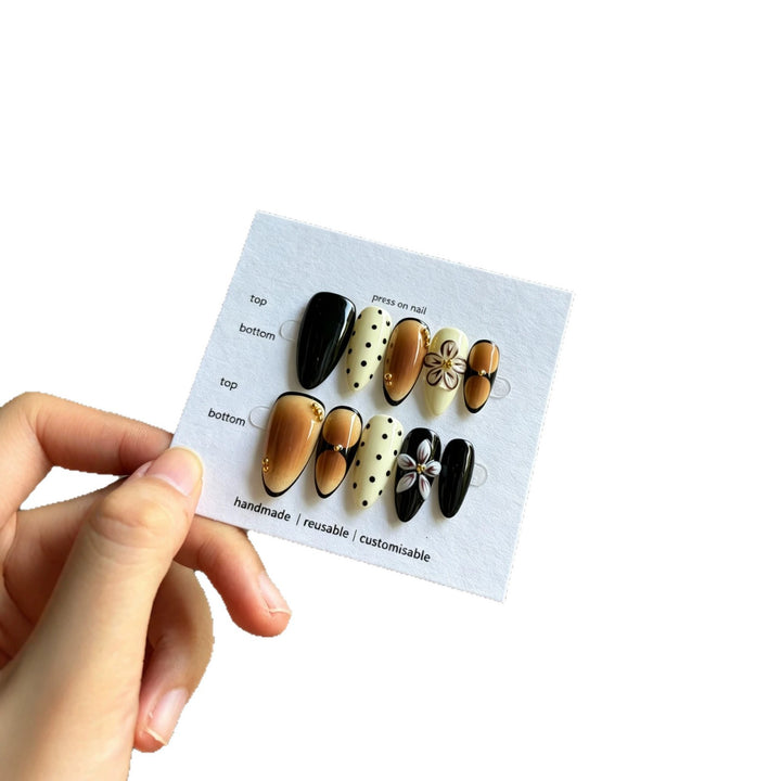 Artistic Press-On Nail Set with Reusable Floral and Polka Dot Designs