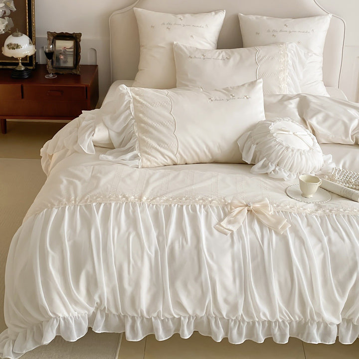 Romantic ruffle duvet cover set with frill, bow appliqué and delicate embroidery