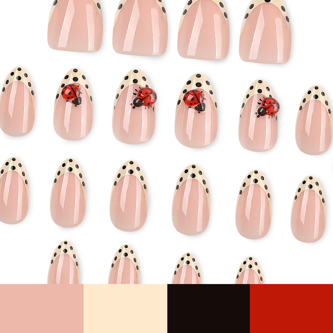 Artful nail art with ladybug motif and polka dots Kalsten