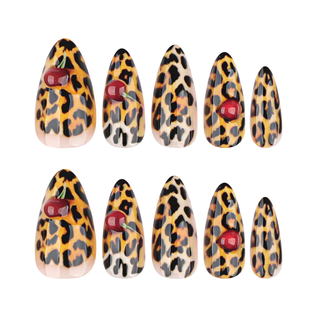Artful stiletto nails with leopard pattern and accents Kalsten