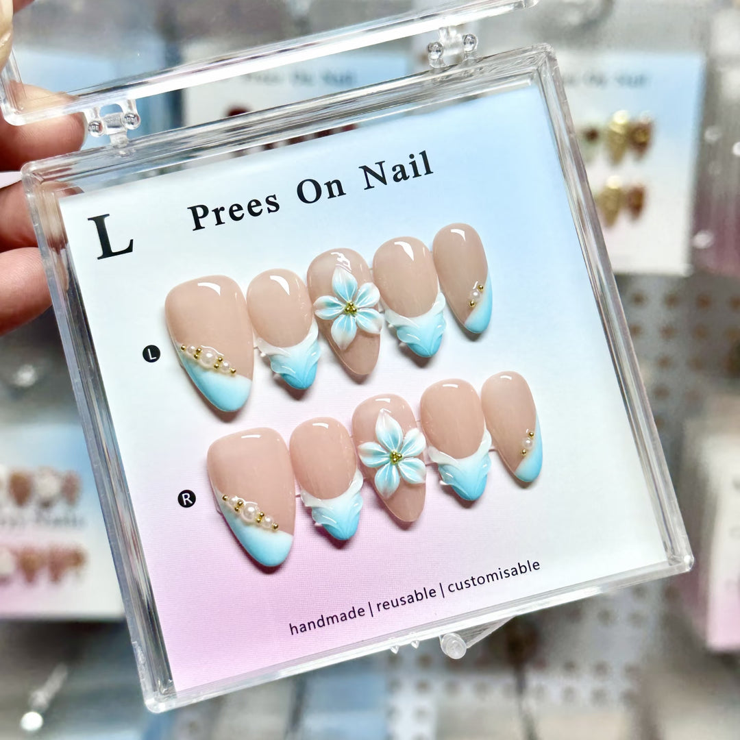Artistic Press-On Nail Set with Floral and Green Accents