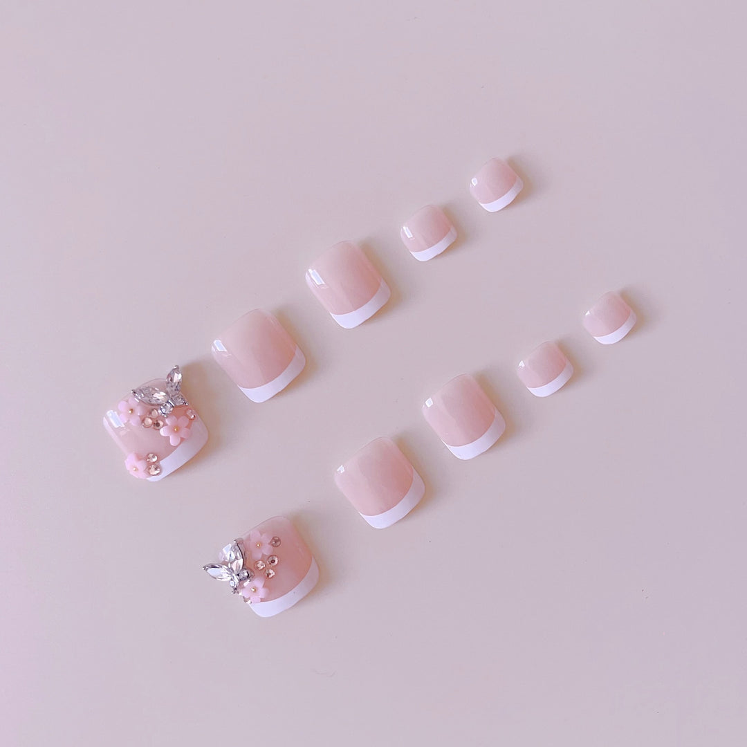 Acrylic nail set with elegant 3D flowers and glitter accents Kalsten