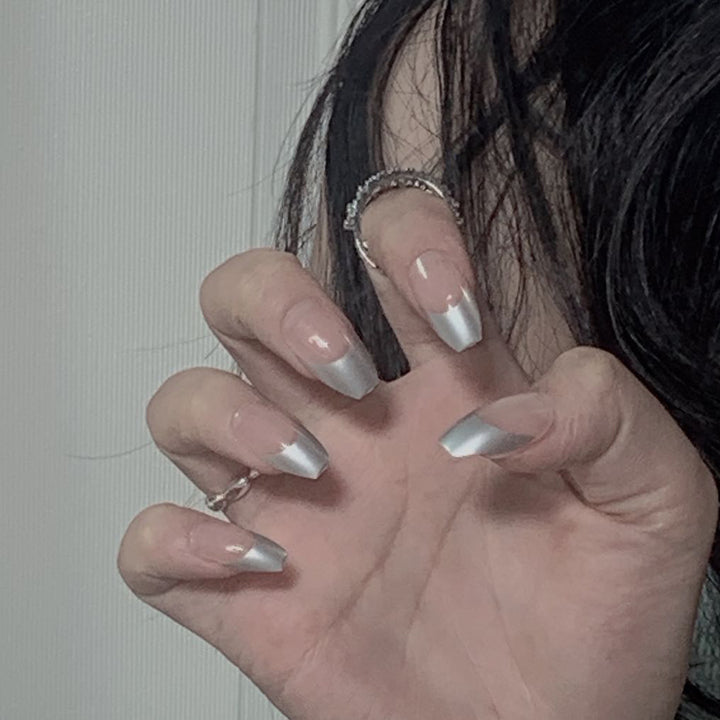 Artificial stiletto nails with glitter accents and elegant French tip Kalsten