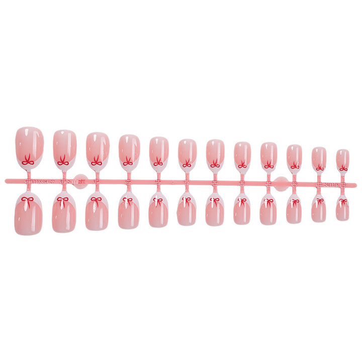 Nail art set with delicate bow designs Kalsten