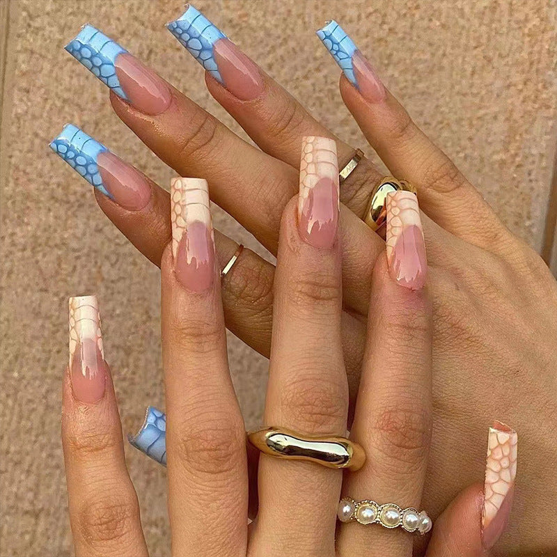 Artificial nail extensions with modern designs and creative color accents Kalsten