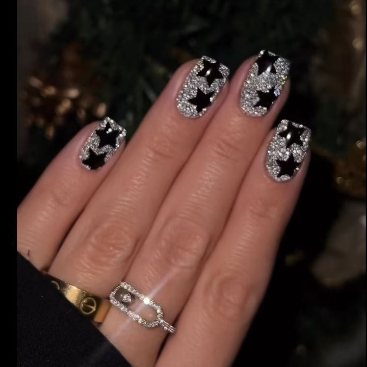 Artificial nail set with glamorous rhinestone embellishments and star motifs Kalsten