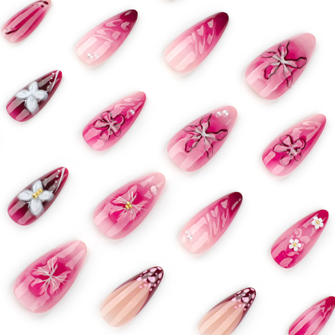 Artful nail extensions with floral details and ombre effect Kalsten