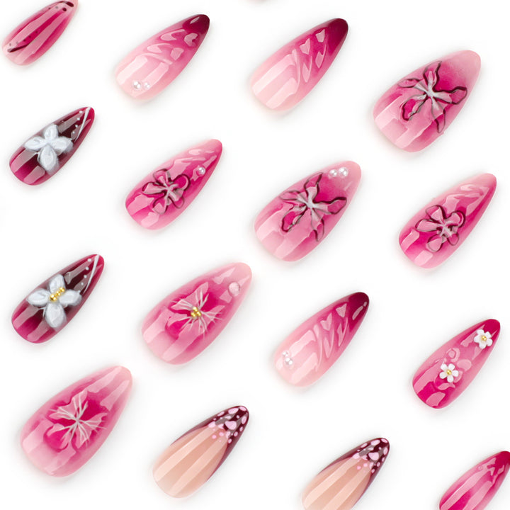 Artful nail extensions with floral details and ombre effect Kalsten