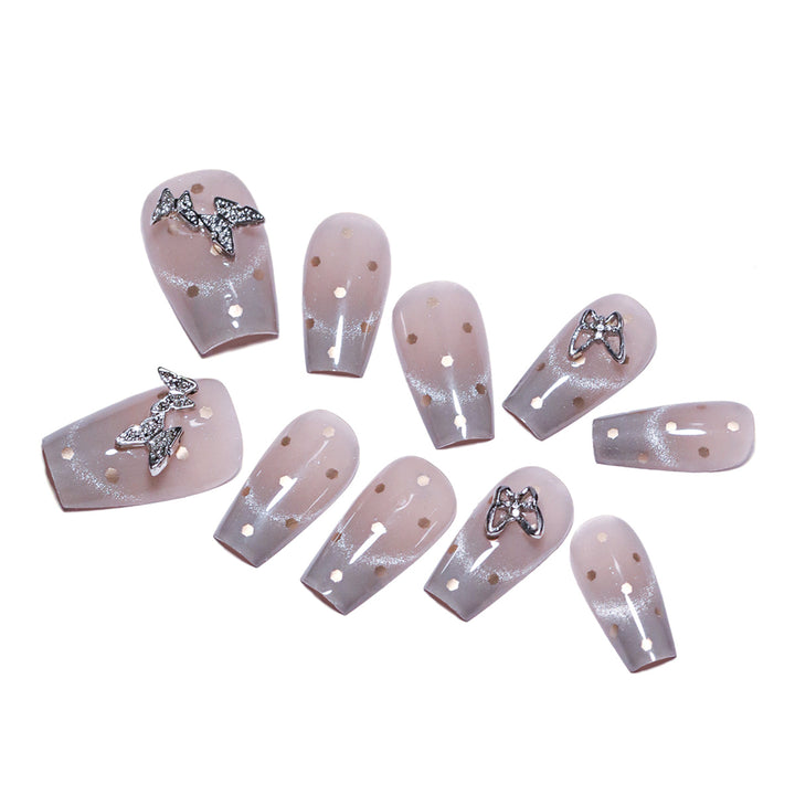 Artificial nail art with glitter details and bow accents Kalsten