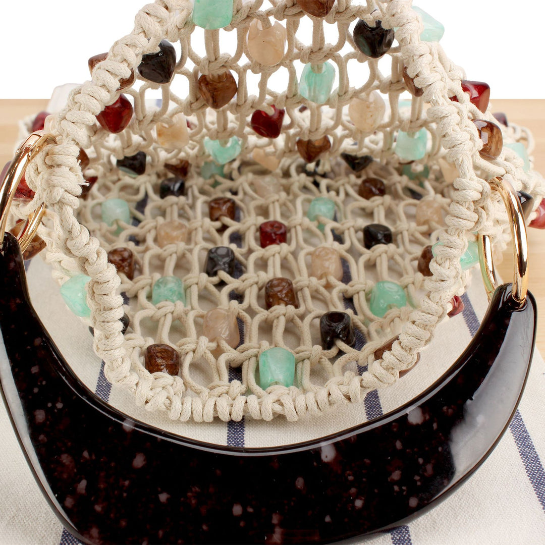 Fashionable handbag in creative net design with colorful accents Kalsten