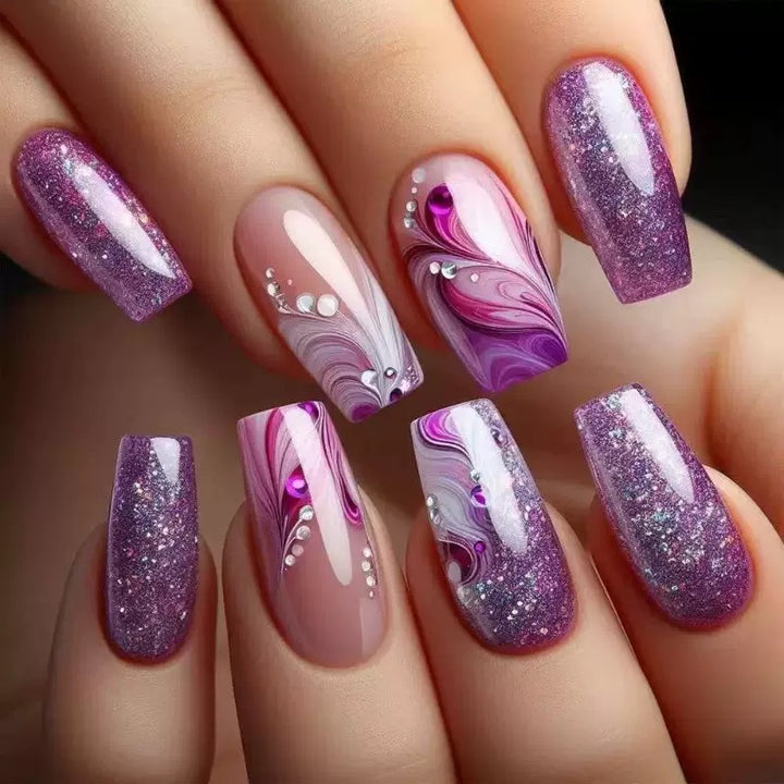 Acrylic nail set with luxurious color gradients and sparkling accents Kalsten