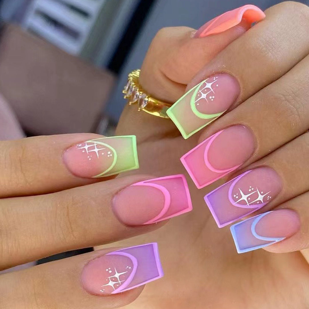 Acrylic nail set with colorful geometric designs and glitter accents Kalsten