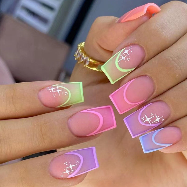 Acrylic nail set with colorful geometric designs and glitter accents Kalsten