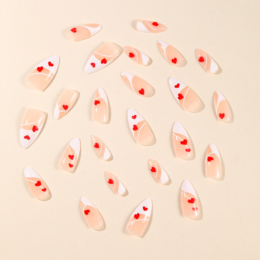 Heart-Embellished Stiletto Nail Art Kalsten