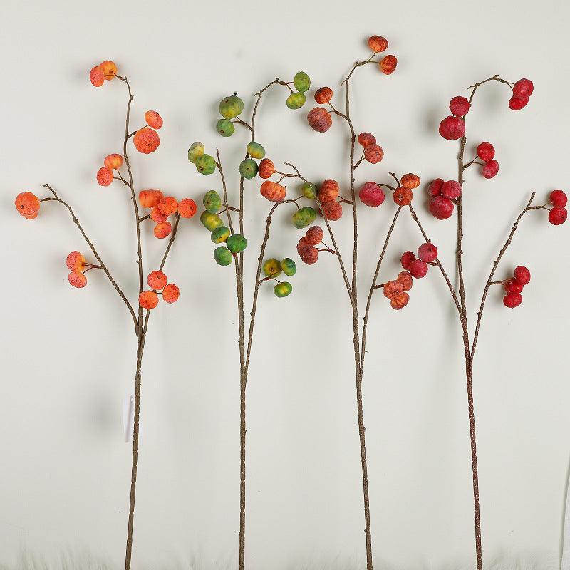 Artificial decorative branch with dried-looking pumpkin balls and flexible wire stem