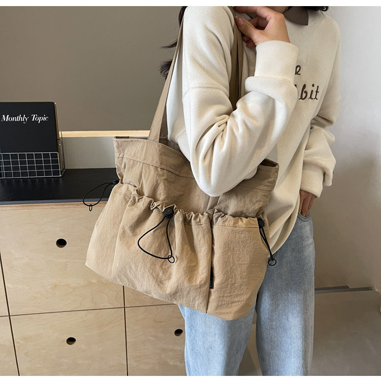 Practical everyday handbag with drawstring Kalsten