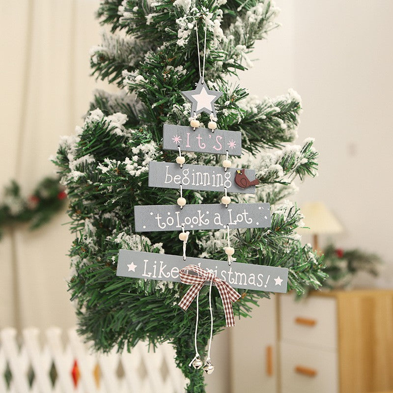 Decorative wooden sign with Christmas greeting Kalsten