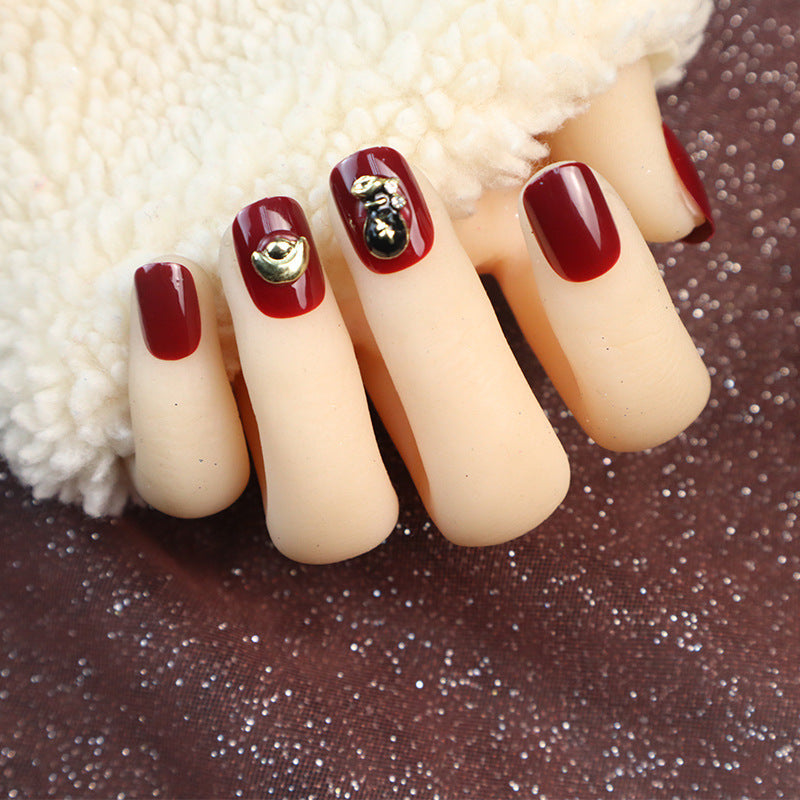 Decorative Press-On Nail Set with Unique Gold Accents