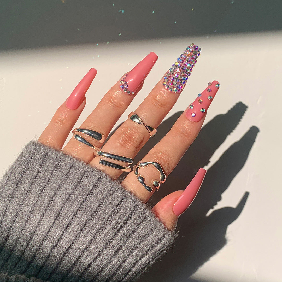 Artful Nail Extensions with Decorative Rhinestone Embellishments Kalsten