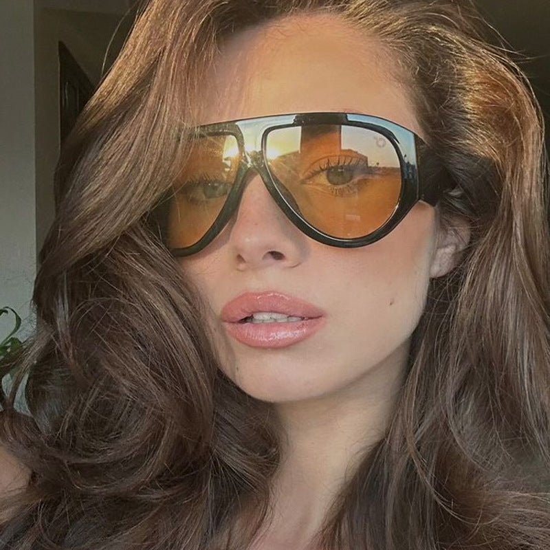 Ladies fashionable sunglasses in modern design with wide frame Kalsten