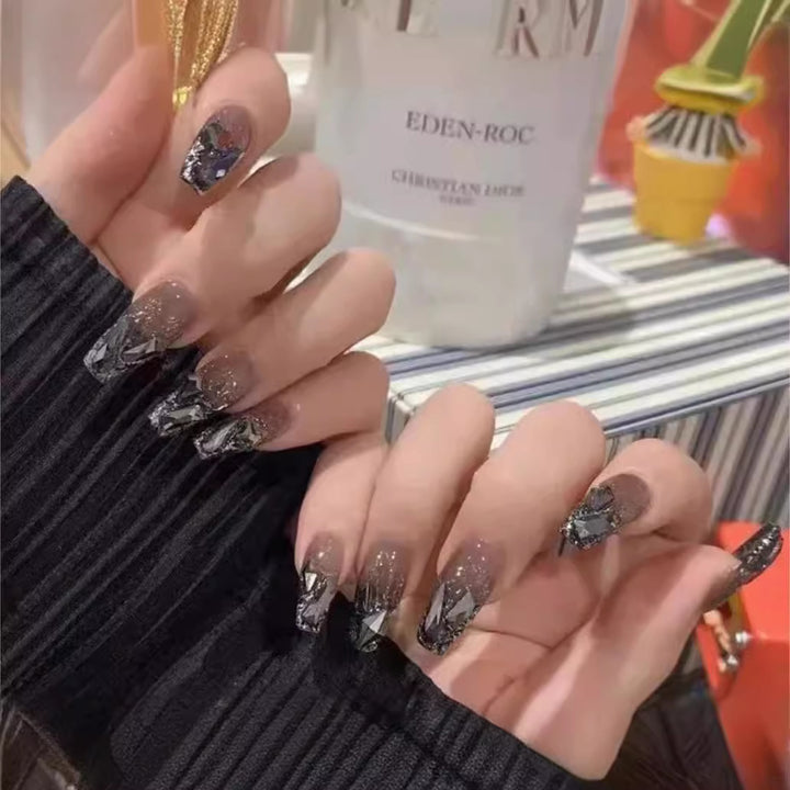 Elegant Nail Art with Glitter and Rhinestones Kalsten