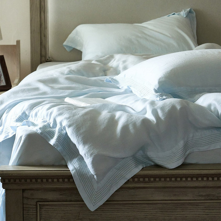 Luxury cotton bedding set with fine piping and elegant linen look